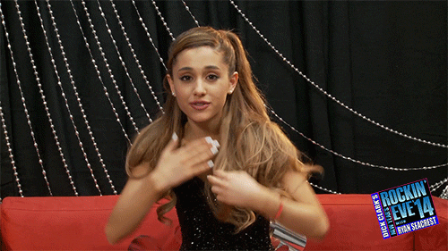 Celebrity gif. An excited Ariana Grande blows us a kiss with both hands and smiles.
