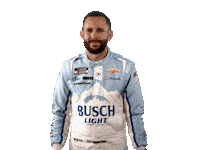 Sponsored sticker gif. NASCAR driver Ross Chastain shrugs in confusion. He wears a driver fire suit decorated with many sponsor logos with the largest being the Busch Light beer logo across the center of his abdomen.
