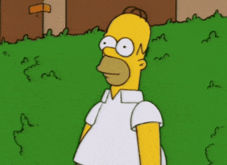 Homer Simpson disparait dans les buissons. 