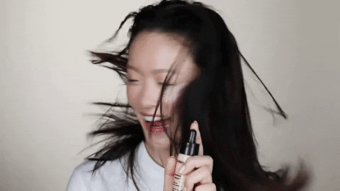 beauty hair flip GIF