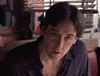 Celebrity gif. A frustrated and annoyed John Cusack shakes his head and shrugs in exasperation.