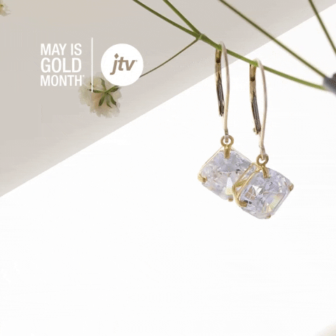 gold earrings GIF