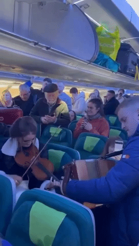 Irish Band Entertains Travelers on Flight