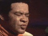 Celebrity gif. Musician Bill WIthers clenches his eyes in soulful song. Text, "I know, I know, I know."