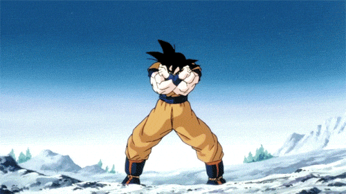 Anime gif. Goku from Dragon Ball Z standing in the snow flexes aggressively and transforms into Super Saiyan.
