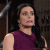 TV gif. Manjit Minhas, a judge from The Dragon's Den, pulls a face and looks horrified at what she's seeing. Her eyes go wide and she grits her teeth while her lips turn down.