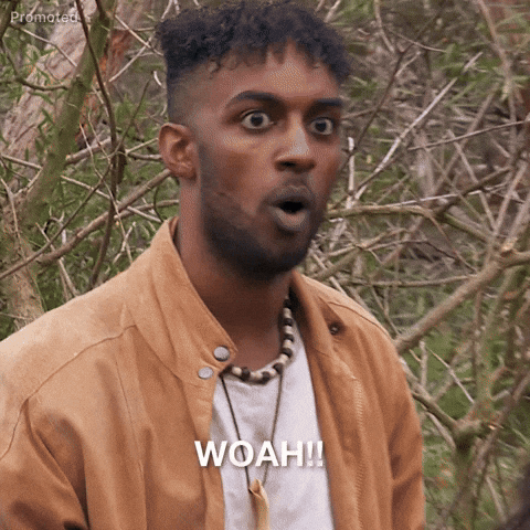 Sponsored gif. Hakeem Moulton, a contestant from season 21 of The Bachelorette, sees something out of frame in a woodsy environment, opens his mouth with a shocked and surprised expression, eyes wide and eyebrows raised. He turns quickly and walks in the other direction in the woodsy environment. Text reads, "woah!!"