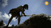 CuriosityStream axe hitting caveman curiositystream GIF