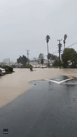 Locals Kayak Down Flooded Street in San Luis Obispo