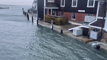 Floodwater Surges Along Canal in Woods Hole as Winter Storm Hits