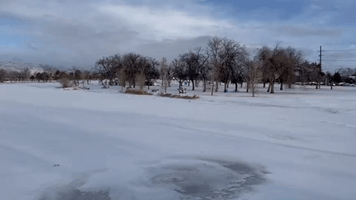 Snow Covers Frozen Lake in Colorado Springs