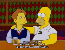 sitting homer simpson GIF