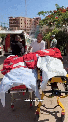 Palestine Red Crescent Crew Mourns Colleagues Outside Hospital in Khan Yunis