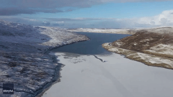 Shetland Islands Workboat Breaks Path Across Icy Bay