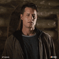TV gif. Justin Hartley as Kevin in This Is Us. He sees something he doesn't want to see and he squeezes his eyes shut as he turns his head away.