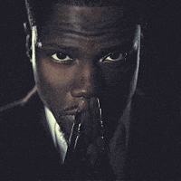 Staring Kevin Hart GIF