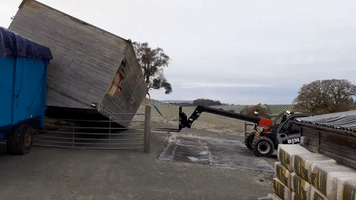 Groundsman Rights Field Shelter That Was Flipped by Storm Winds