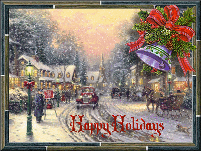Video gif. Snow falls gently in front of a Christmas card featuring a scene of a festive, snowy town. Text, “Happy Holidays.”