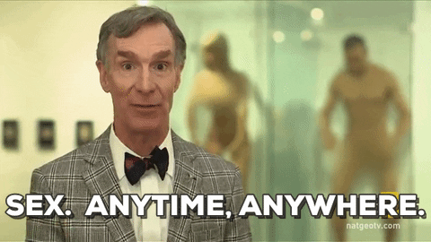 Celebrity gif. Wearing a plaid suit and bowtie, Bill Nye stands in front of two nude mannequins and says, “Sex. Anytime, anywhere,” before walking away.