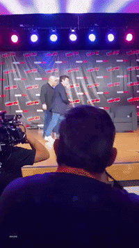 Great Scott!: Michael J Fox and Christopher Lloyd Share Hug on Stage at New York Comic Con