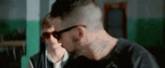 babydrivermovie sunglasses slap jon bernthal ansel elgort GIF
