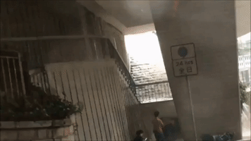 Typhoon Merbok Turns Hong Kong Staircase Into Waterfall