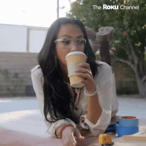 Person enjoying their morning coffee with energy and satisfaction