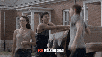 the walking dead laughing GIF