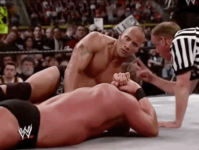 dwayne the rock johnson wrestling GIF by WWE