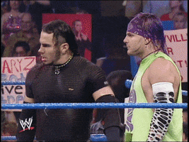 Sports gif. WWE stars Matt and Jeff Hardy wait impatiently in the ring, ready for a fight.