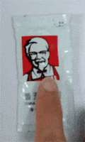 squeezing colonel sanders GIF