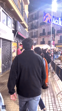 Son Flies Home to Surprise Father for Festival in Valencia