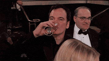 surprised quentin tarantino GIF
