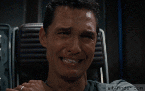 Movie gif. Matthew McConaughey as Cooper in Interstellar grits his teeth as he fights back tears, but he can’t stop his sobbing. He covers his mouth in anguish.