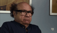 TV gif. Danny Devito as Frank on It’s Always Sunny in Philadelphia shakes his head very quickly and stares through his glasses with fearful; eyes. He says, “nope…”