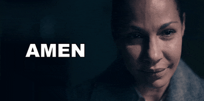 TV gif. Amanda Brugel as Rita in The Handmaid’s Tale looks up with tears in her eyes and says, “Amen.”