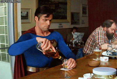 superman drinking GIF