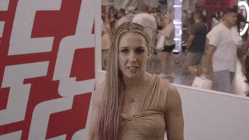 Celebrity gif. Vanessa Demopoulos frowns and recoils back slightly, grossed out.