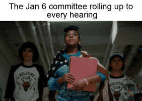 Stranger Things gif. Finn Wolfhard as Mike Wheeler, Priah Ferguson as Erica Sinclair, and Gaten Matarazzo as Dustin Henderson strut confidently down a hallway. Finn and Gaten wear matching Hellfire Club t-shirts and Priah wears an American flag tied around her neck like a cape. Text, "The Jan. 6 committee rolling up to every hearing."