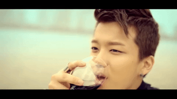 k-pop drinking GIF