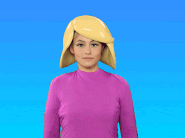 Video gif. Woman dressed like the blonde hair pink shirt woman emoji looked at us with an alarmed expression and crossed her arm in front of her like a big X.