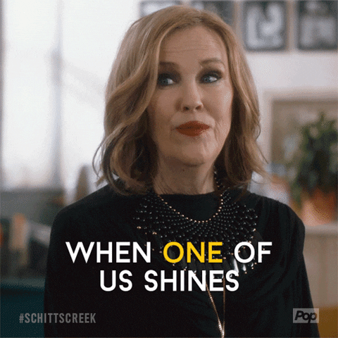 Catherine O'Hara saying "When one of us shines, all of us shine."