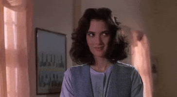holding it in winona ryder GIF