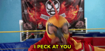 i peck at you lucha libre GIF by Team Coco