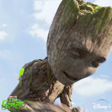 Cartoon gif. In a scene from I Am Groot, Groot claps cheerfully.