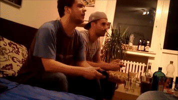 rodolfoyuzo angry gamer throw controller against tv and flips GIF