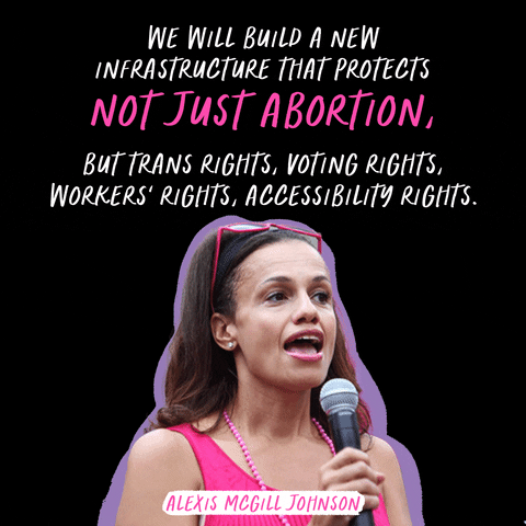 Digital art gif. Alexis McGill Johnson holds a microphone to her mouth. White and pink text above her head reads, "We will build a new infrastructure that protects not just abortion, but trans rights, voting rights, workers' rights, accessibility rights."