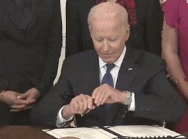Joe Biden Signing Bill GIF by GIPHY News