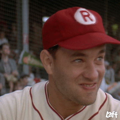 Movie gif. Tom Hanks as Jimmy in A League of Their Own anxiously watches, clutching his chest in stress.