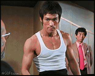 come at me bruce lee GIF